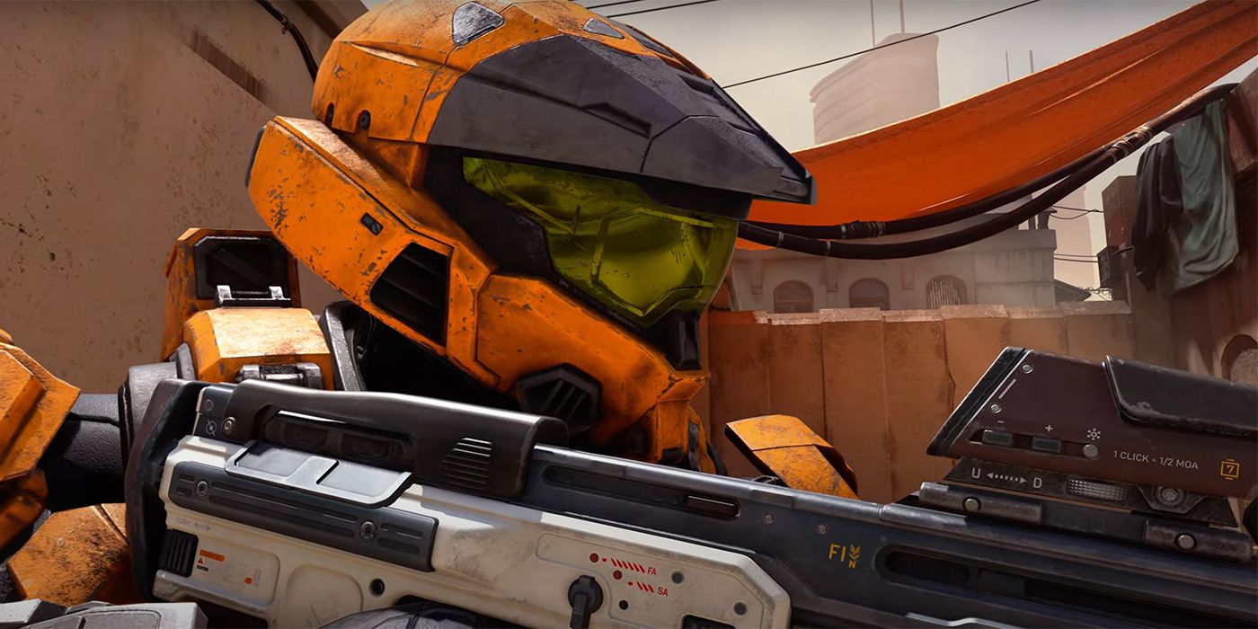 Halo Infinite orange Spartan holding Assault Rifle
