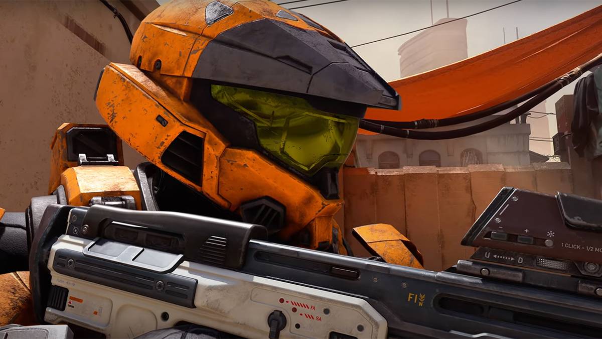 Halo Infinite orange Spartan holding Assault Rifle