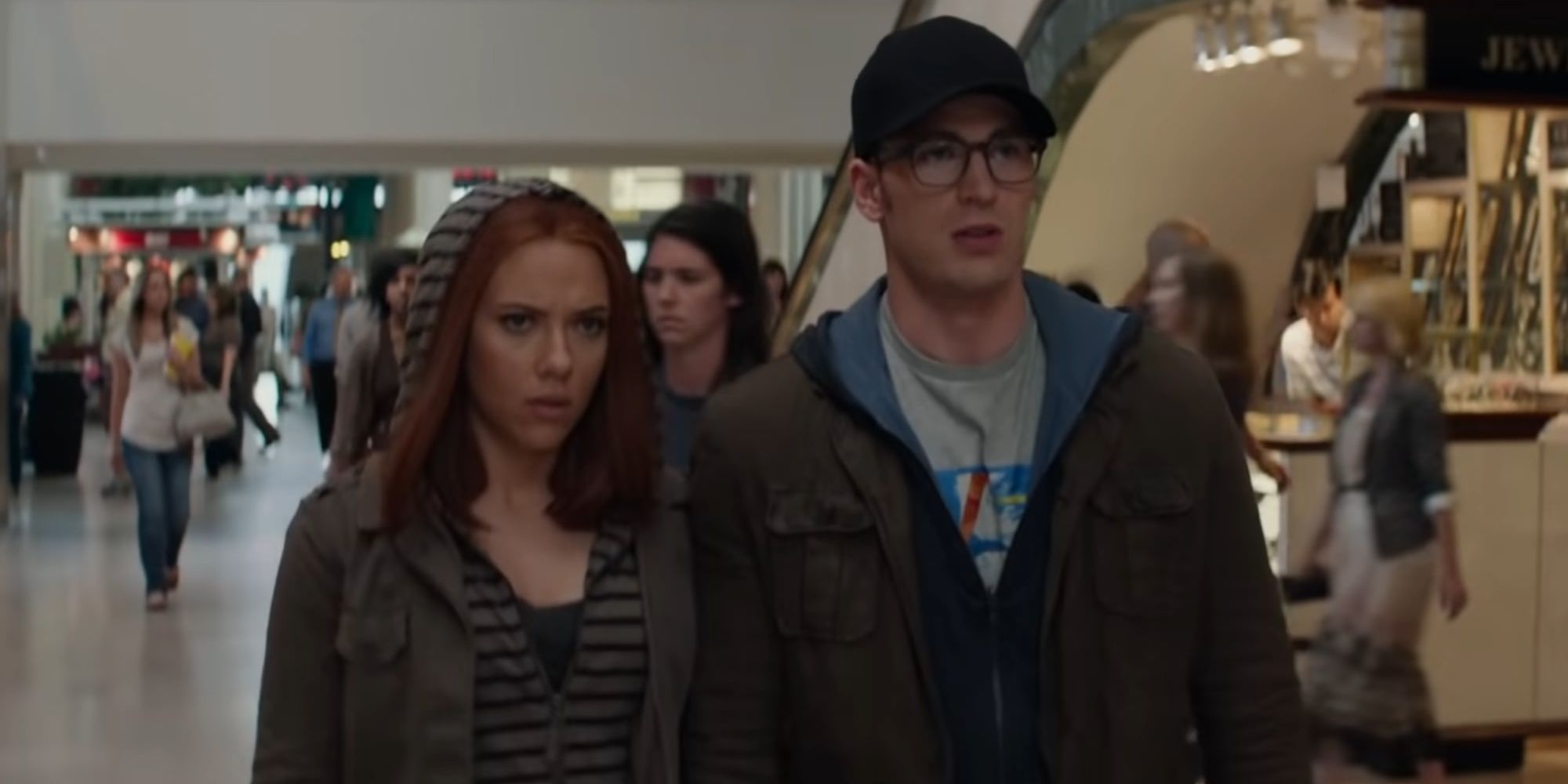 Black Widow and Captain America walking in disguise in Winter Soldier
