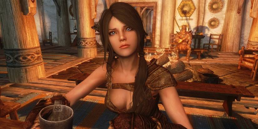 Sofia by Djjohjarvis sits in The Bannered Mare in Whiterun in Skyrim