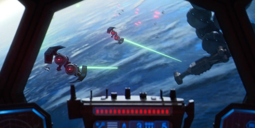 tie fighters shooting a ship