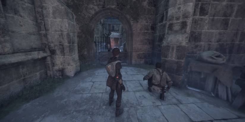An alchemist cart at the University's courtyard in A Plague Tale: Innocence.