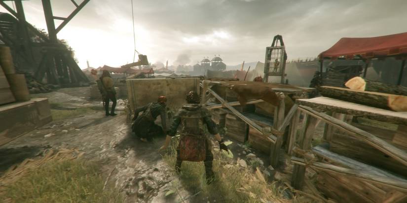 Behind the logs where Hugo is found in a cage in A Plague Tale: Innocence.