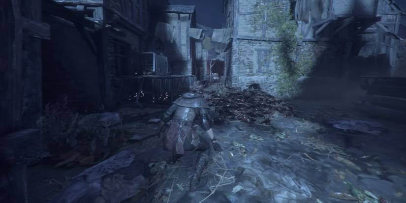 Caged rats blocking a narrow path in A Plague Tale: Innocence.