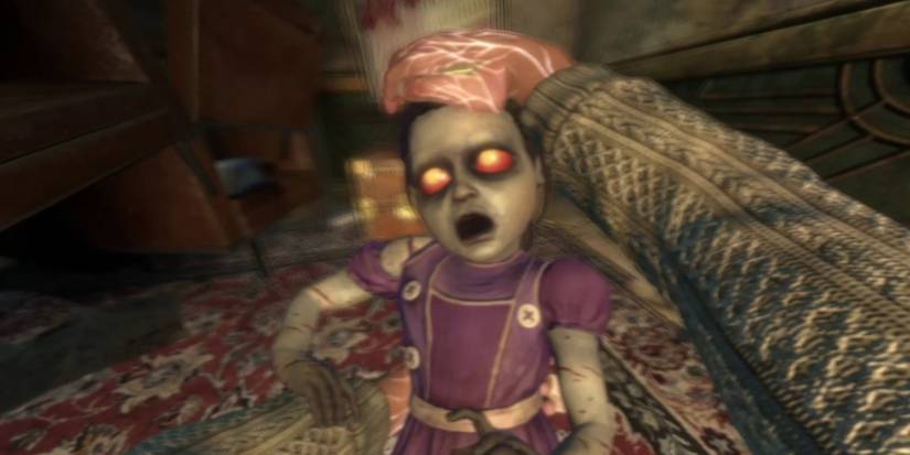 A Little Sister being saved by the player in a carpeted area in BioShock