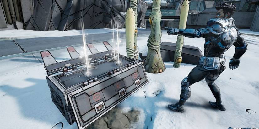 Borderlands 3 Zane points at a white chest