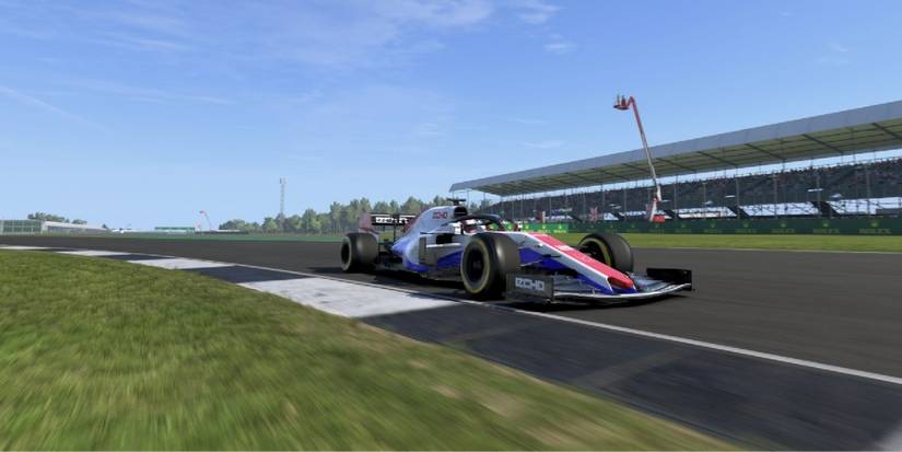 A picture of an F1 car racing past