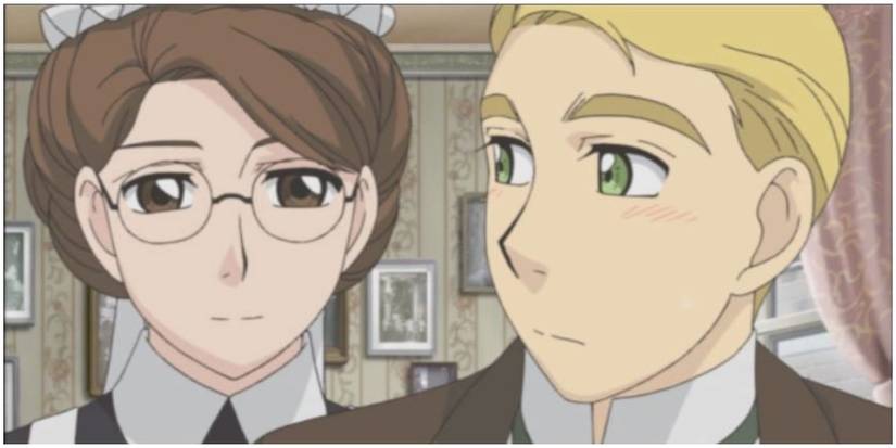 A man blushing while looking at a victorian maid.