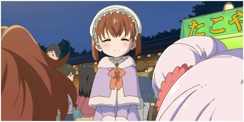 Georgie in a winter maid outfit.