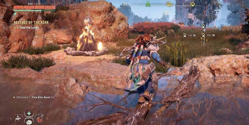 Horizon Zero Dawn Aloy Next to Campfire