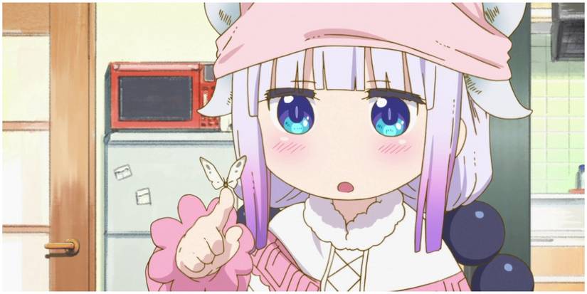 Kanna holding a butterfly.