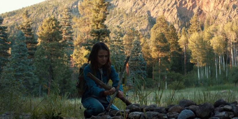 Laura at Logan's grave in Logan