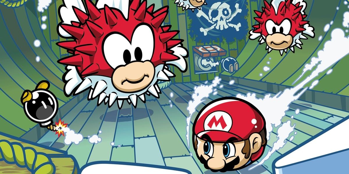 Mario fighting Pufferfish in art for Mario Pinball Land