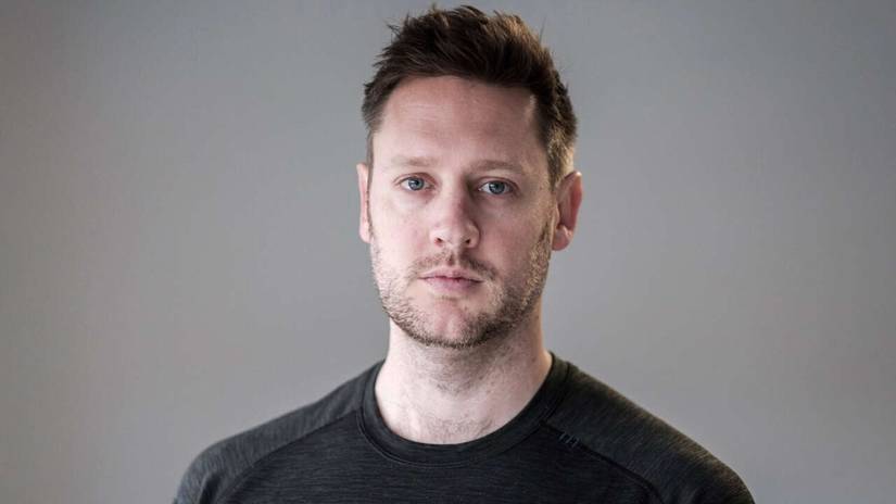 Neill Blomkamp in a grey shirt