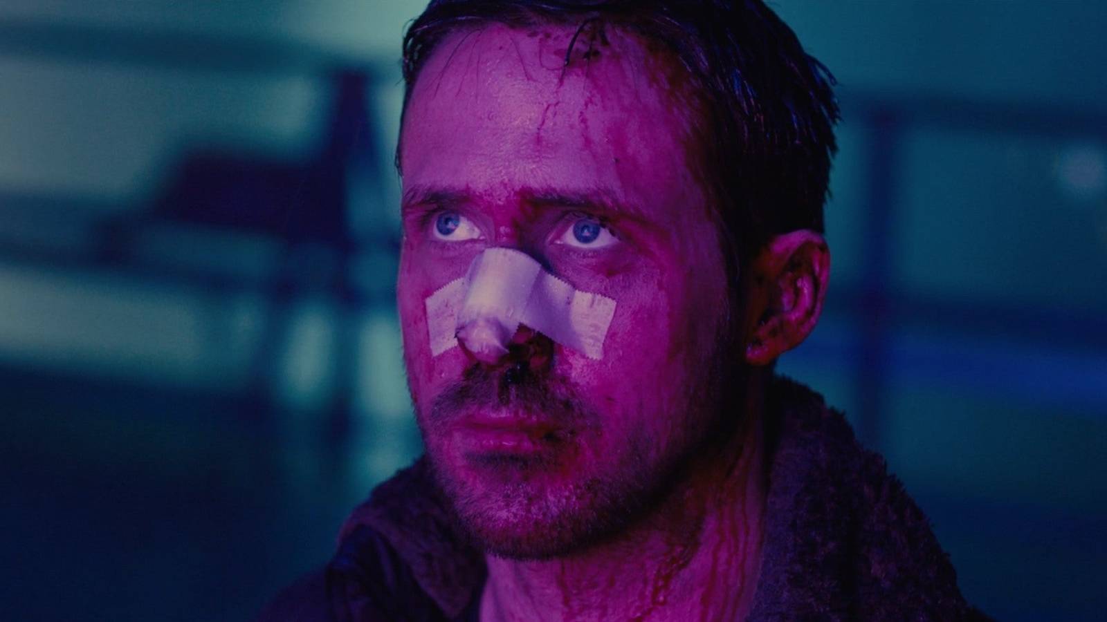 Officer K in pink light in Blade Runner 2049