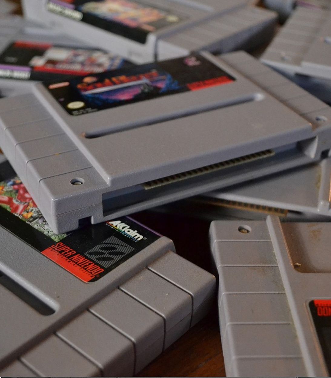 A pile of SNES cartridges shot vertically