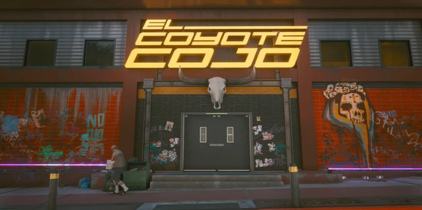 the front of the bar from the outside with a yellow sign.