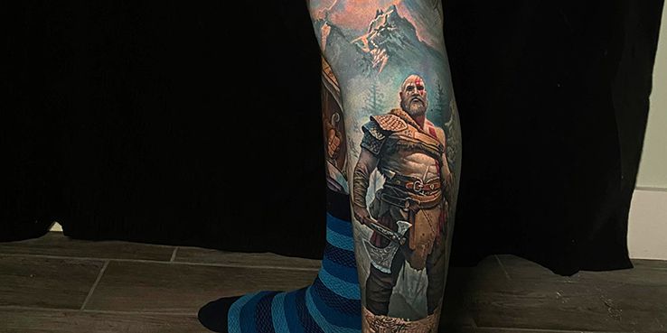 detailed god of war leg sleeve tattoo