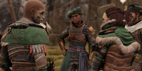 aphra talking to some villagers.