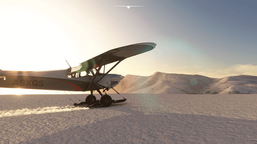 Screenshot from Microsoft Flight Simulator showing a small plane on snowy plains.