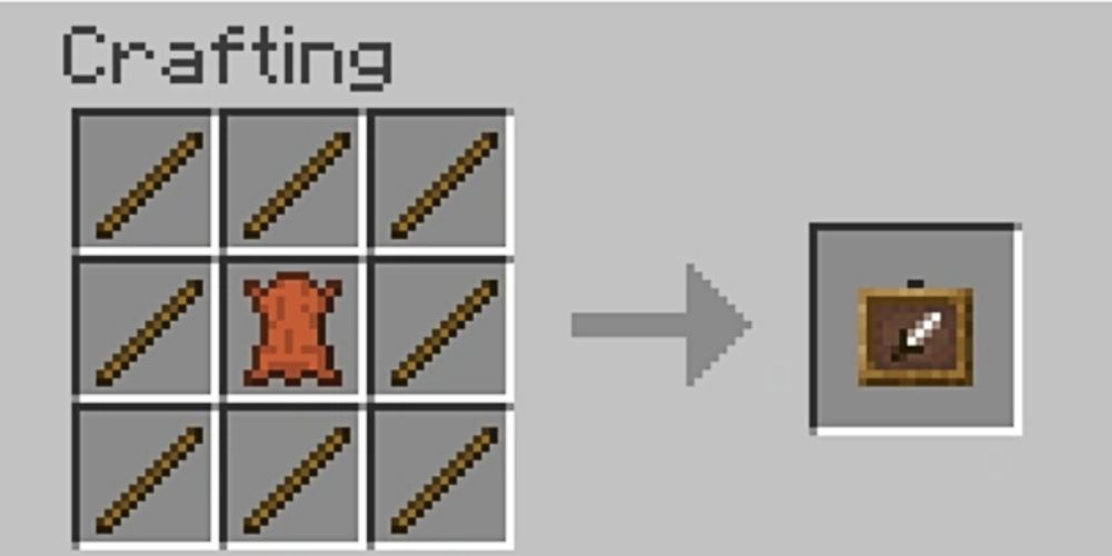 1 leather surrounded by 8 sticks in a crafting table.