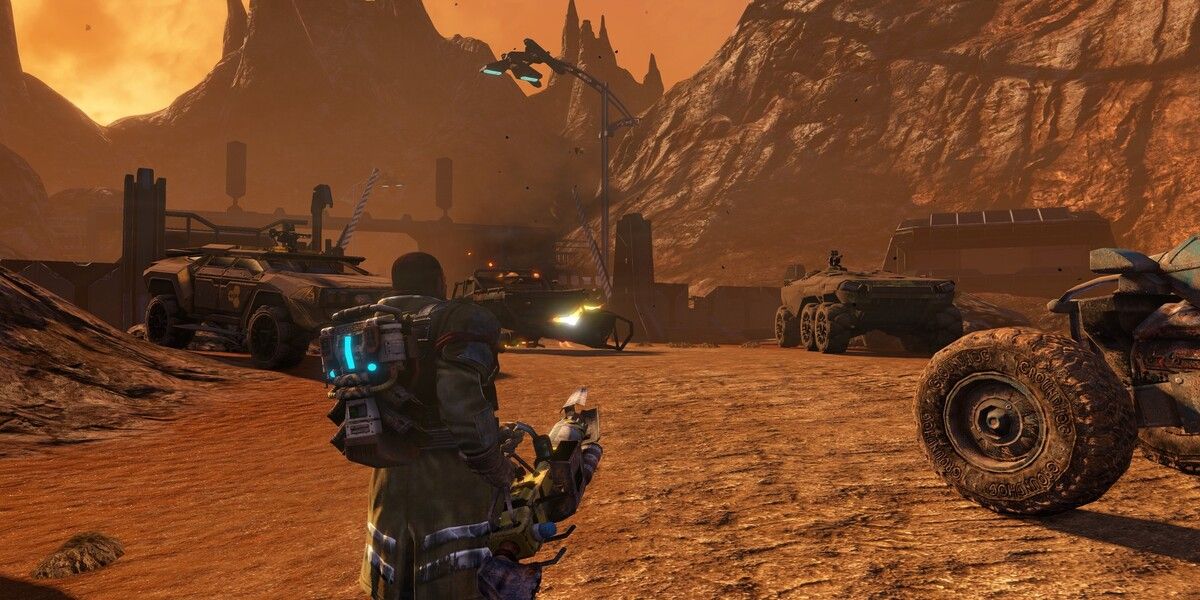 Third-person view of a man with a gun on Mars