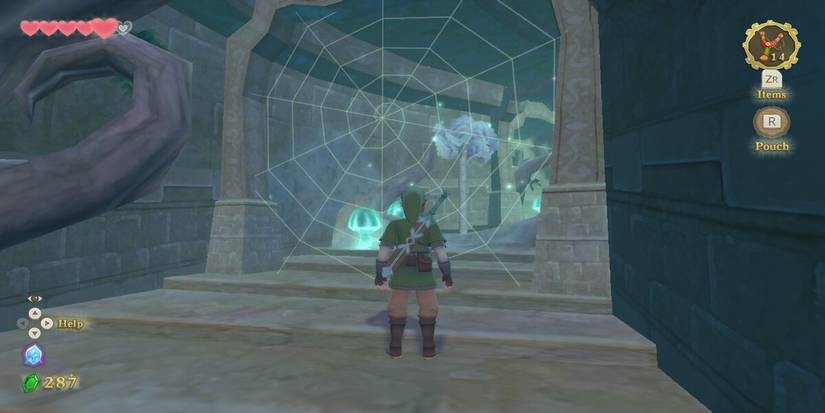 Link facing a web
