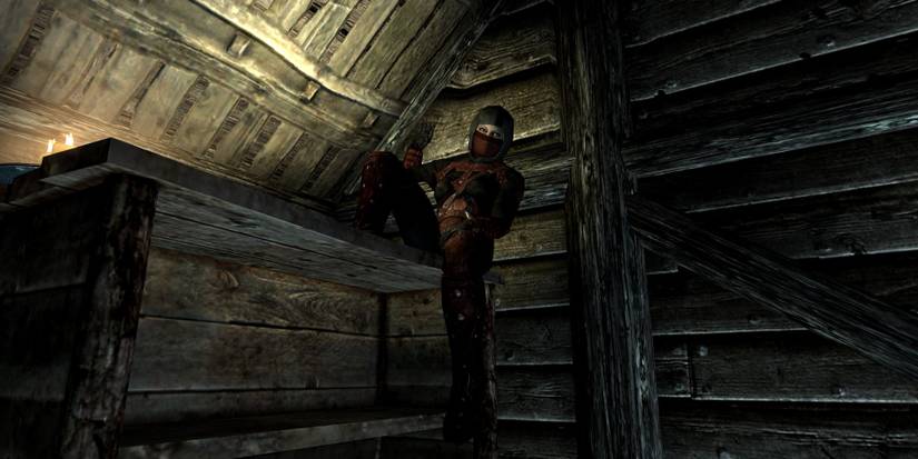 Astrid sitting on shelves in Skyrim