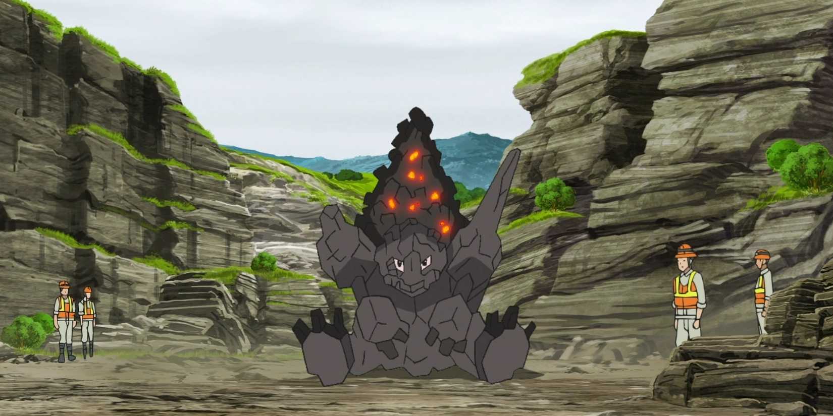 Coalossal sitting in a rocky canyon in the Pokemon anime