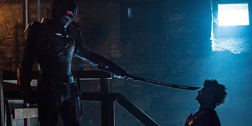 Deathstroke fighting Robin