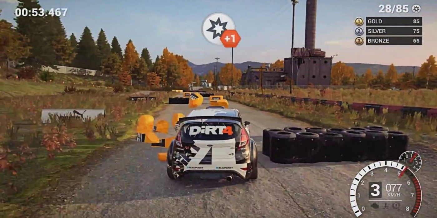Dirt 4 gameplay rally car plowing through obstacles and tires on dirt road