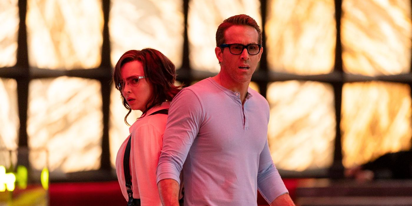 Free Guy couple Ryan Reynolds and Jodie Comer red lighting
