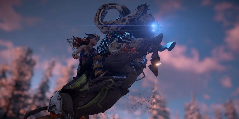 Aloy riding a Charger in Horizon Zero Dawn