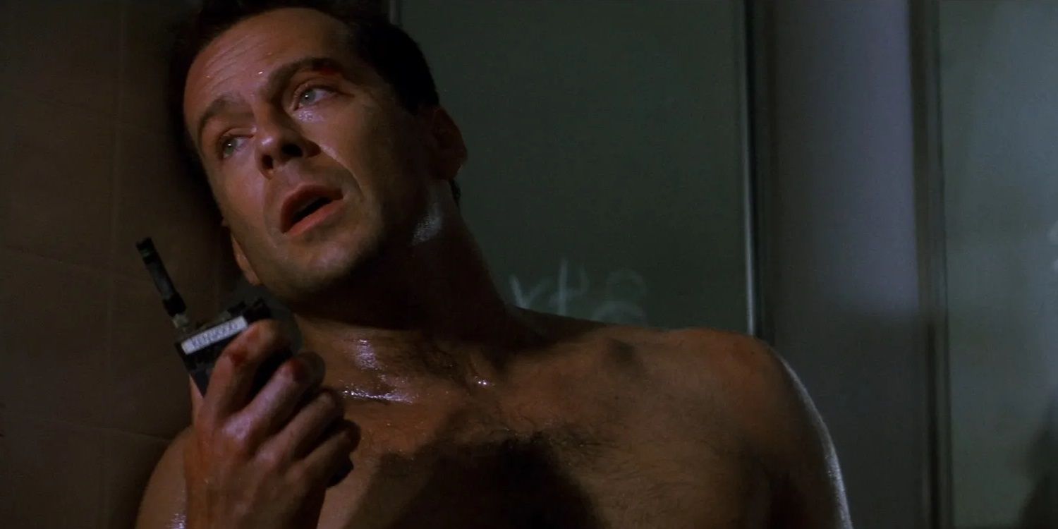 John McClane using a walkie-talkie in Die Hard