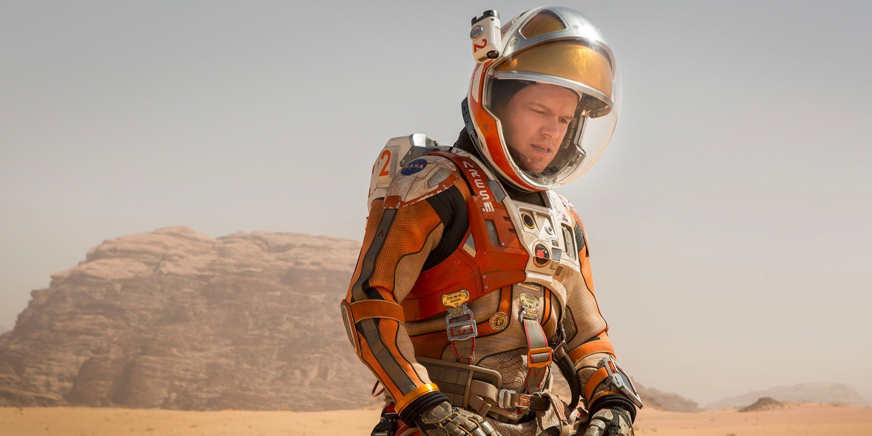 Matt Damon as Mark Watney in a space suit on Mars in The Martian