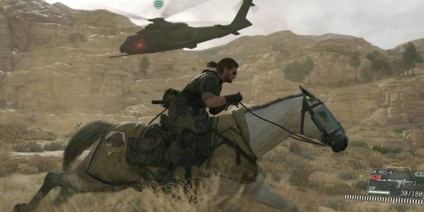 Metal Gear Solid 5 Phantom Pain Snake races on a horse with a helicopter nearby