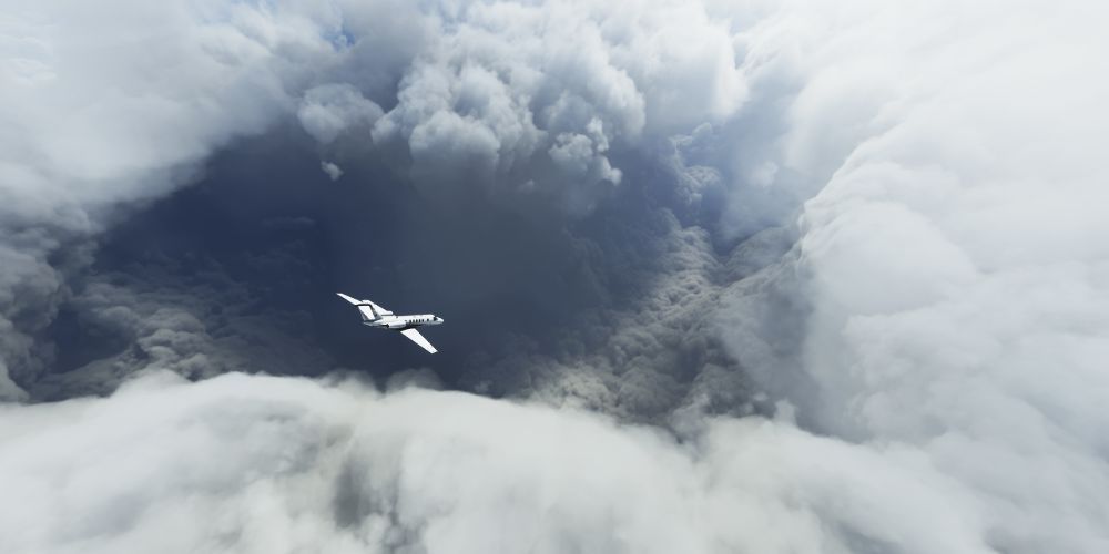 plane in some clouds