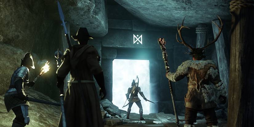 Players venturing into a dungeon in New World MMO