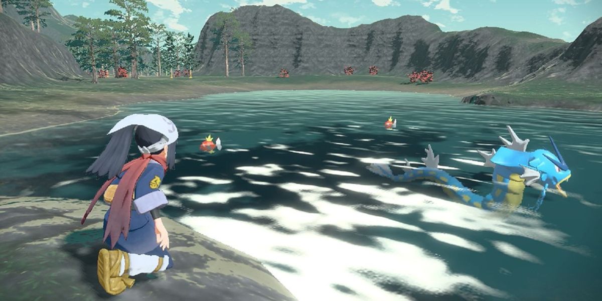 Pokemon Legends Arceus персонаж разведывает водяных покемонов