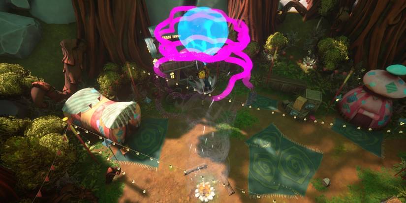 Raz floating over a campfire in Psychonauts 2