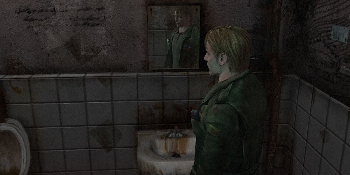 Silent Hill 2 HD Collection James stands in front of a mirror