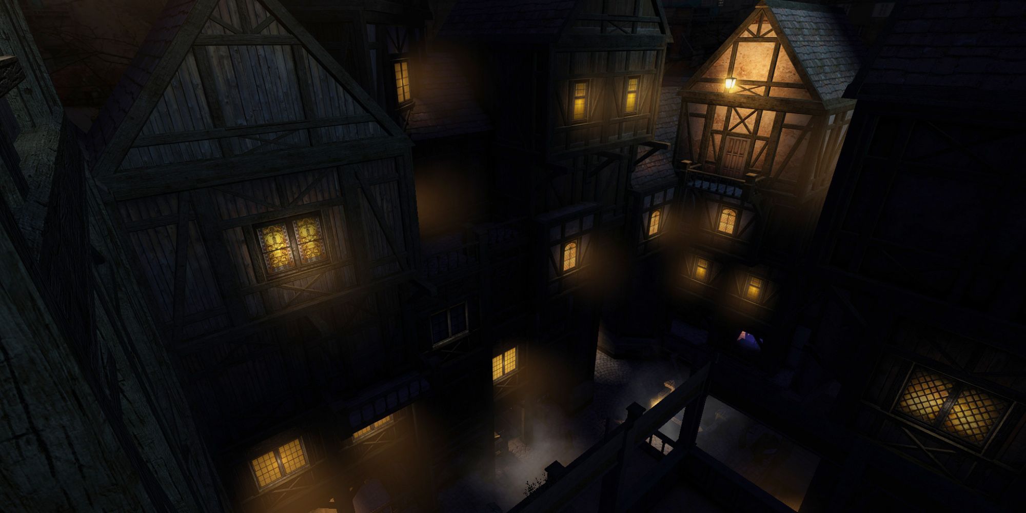 The Dark Mod village at night, lit by windows and lanterns