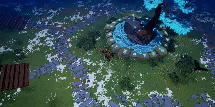 Tribes of Midgard player next to seed of Yggdrasil