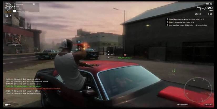 Person leaning and shooting out of a car