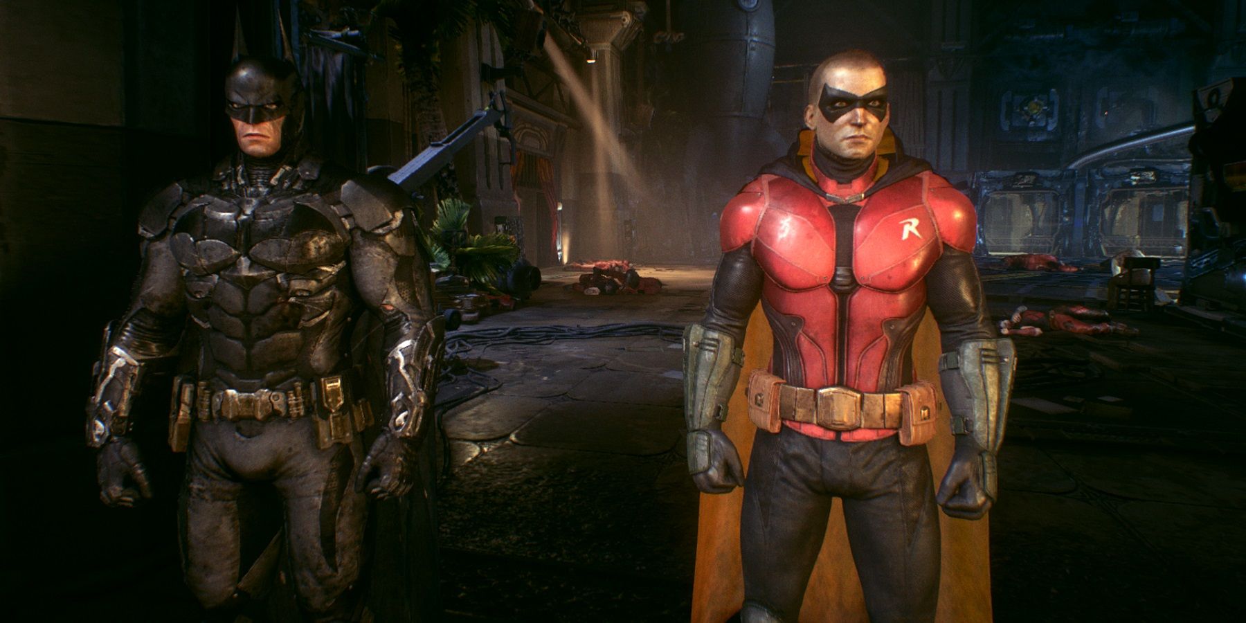 Batman and Robin from Batman: Arkham Knight standing ready for action.