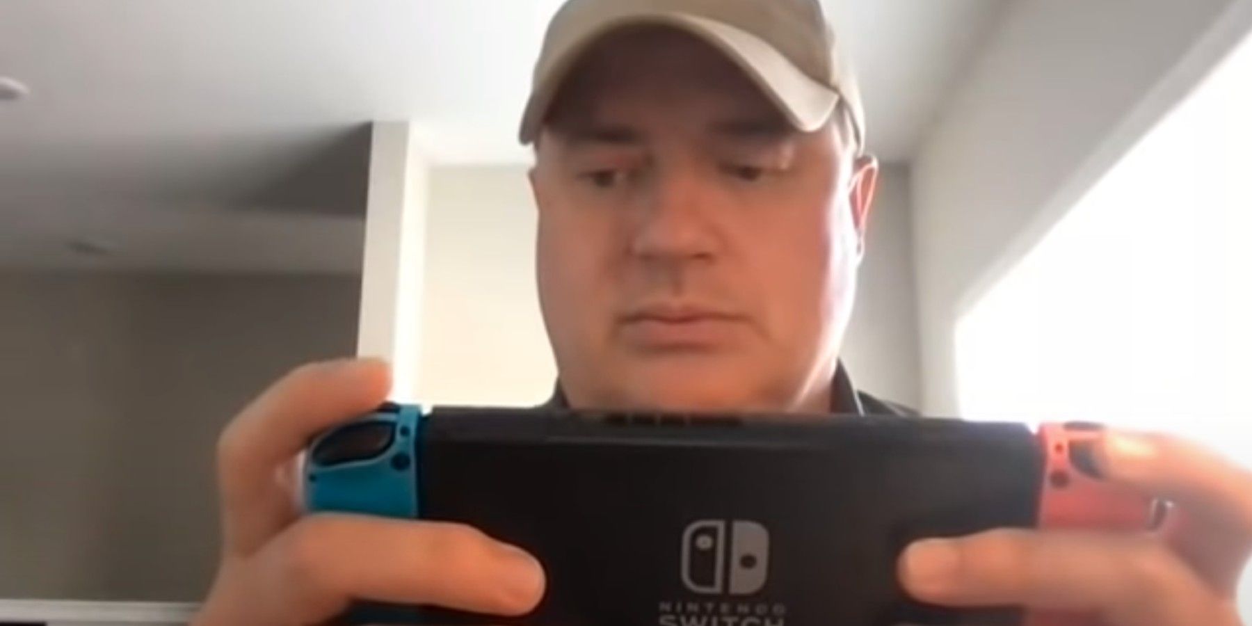 brendan fraser playing his Nintendo Switch