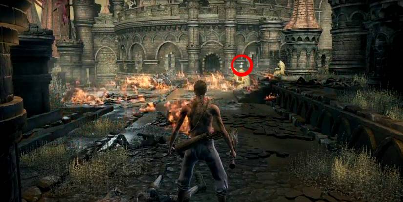 player waiting for the dragon's fire to fade before running to the item on the ground.