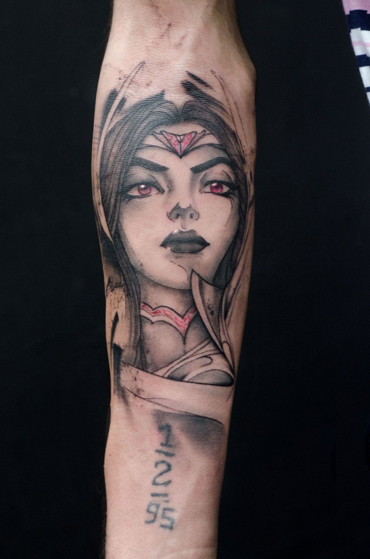 arm tattoo of Irelia's face from League of Legends