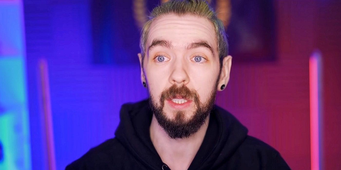 A screenshot of YouTuber Jacksepticeye on a purple and pink background.