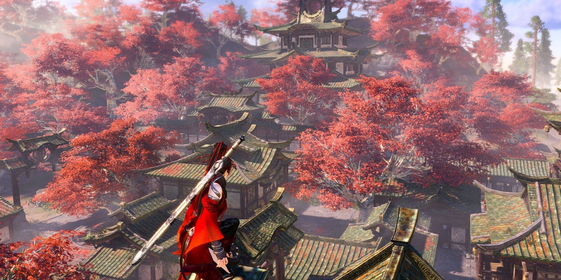 player looking over village with several cherry blossom trees